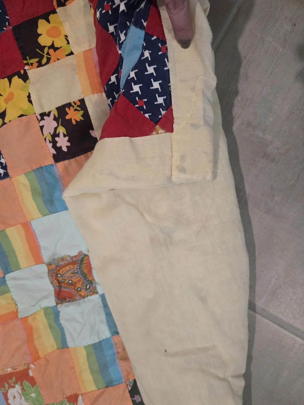 handmade patchwork quilt features a vibrant 